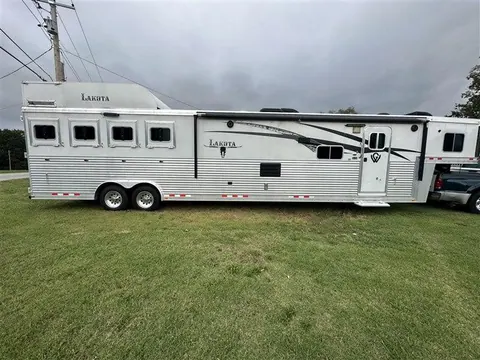 2014 Lakota Bighorn 8416, Generator, Couch, Dinette 17' Shortwall, 4 Horse Trailer, 12' Slide.